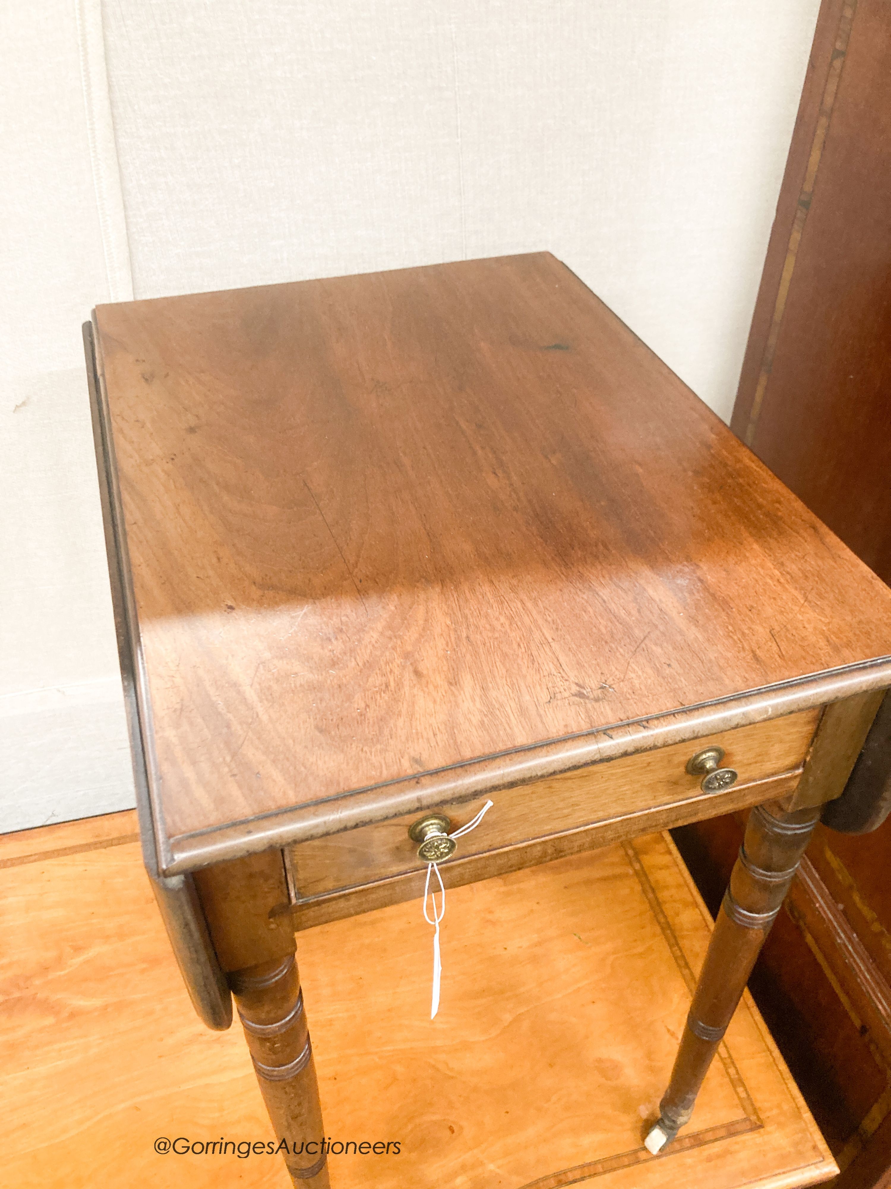 A Regency mahogany drop flap, work table, width 42cm, depth 54cm, height 70cm